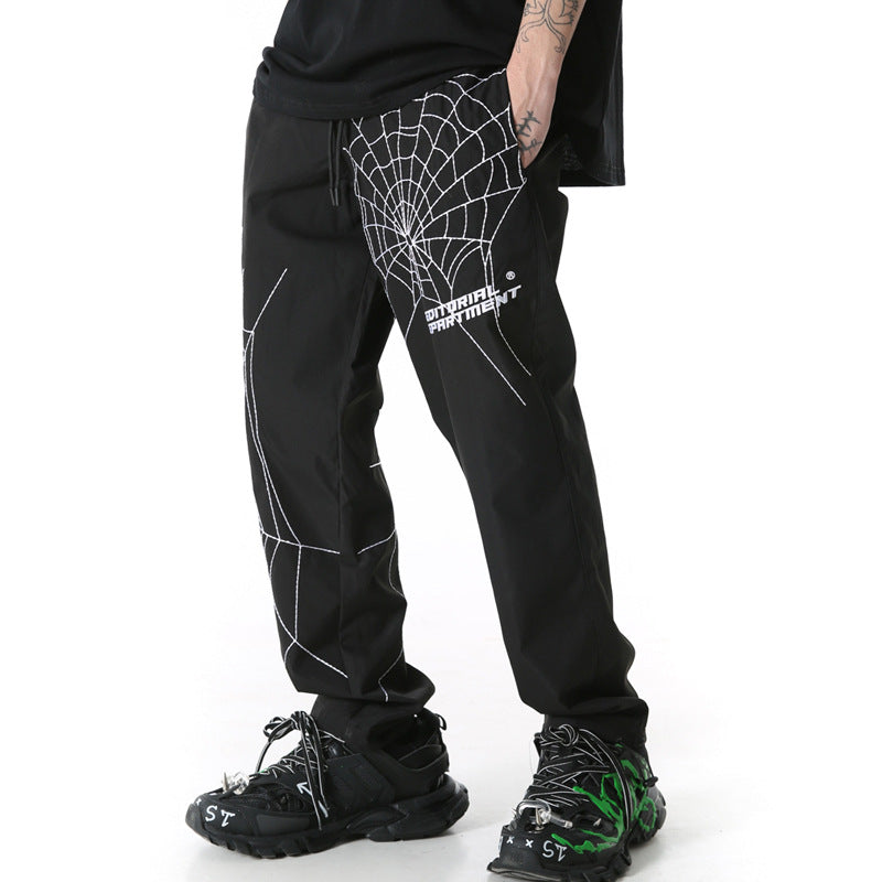 Spiderweb embroidered sweatpants